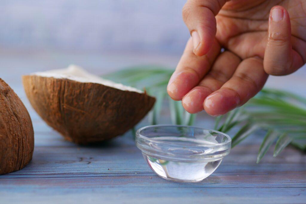 small glass bowl full of Coconut Oil.