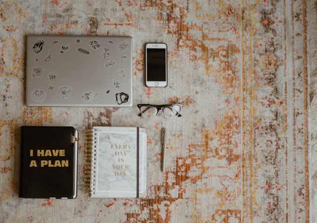 A picture of a Lap Top, Mobile Phone, Diary and a Note Pad with a Pencil, and they can all be used to set up a Schedule