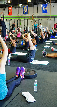 People doing aerobic exercises in a Gym