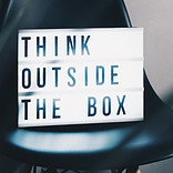 Sign Stating 'Think outside the Box'