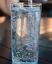 Tall Glass Tumbler being filled with water